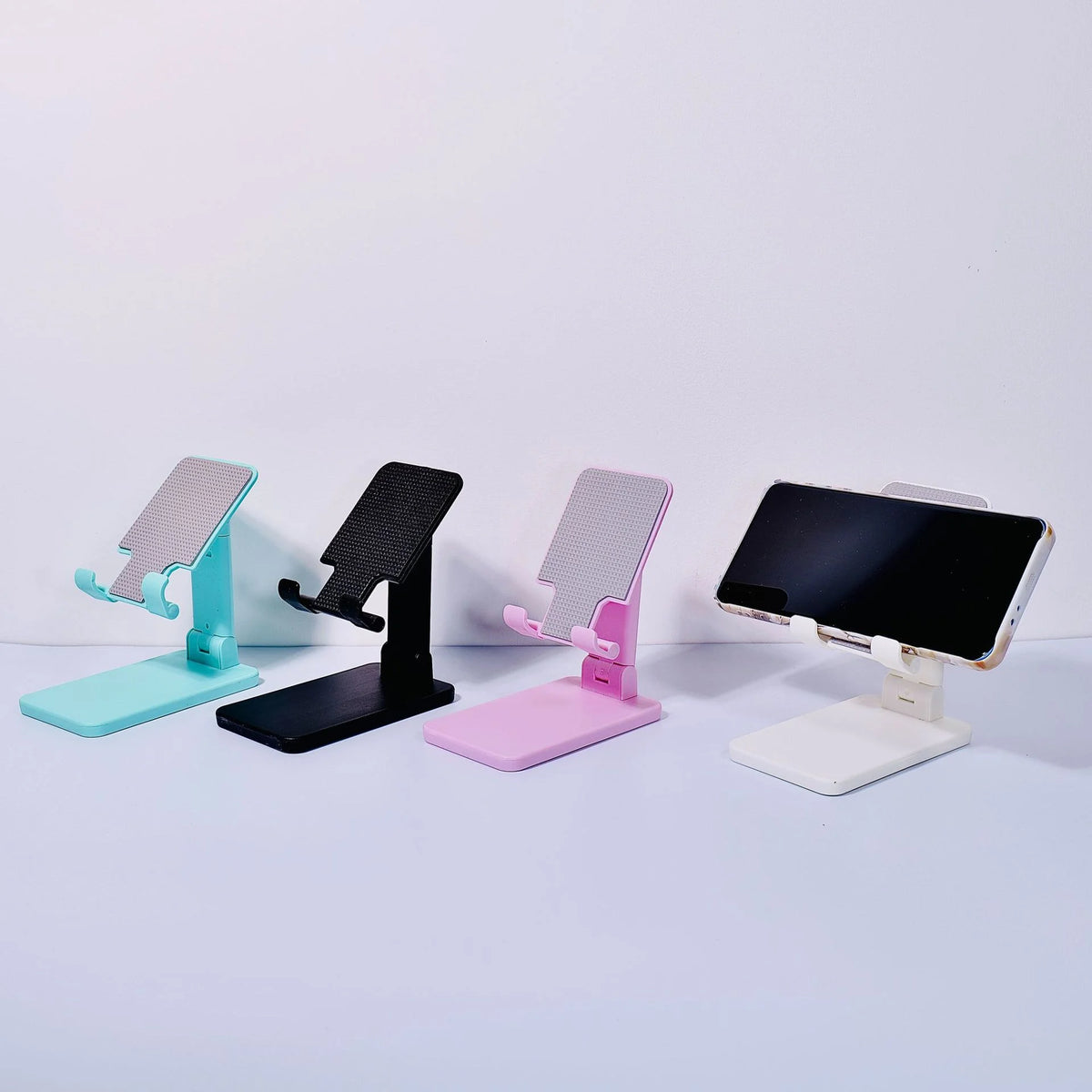 Adjustable Phone & Tablet Stand – Foldable Desk & Bed Holder